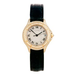 Vintage CARTIER Lady's Yellow Gold and Pave Diamond Cougar Wristwatch