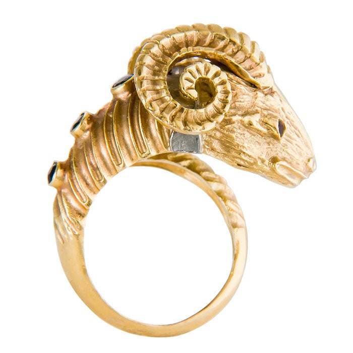 18K yellow gold Rams head Ring by Zolotas, set with Sapphires and Ruby Eyes. Finger size = 6