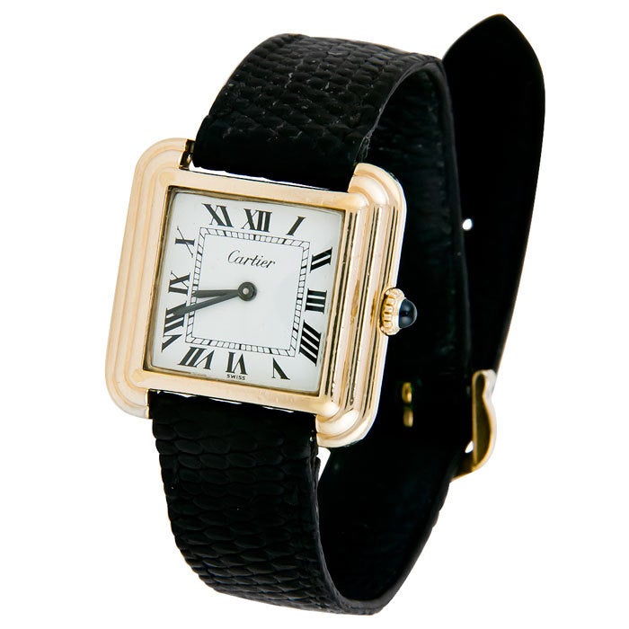 Cartier gold-plated stepped-case wristwatch, circa 1970s. Manual-wind movement, white dial with Roman numerals. New black lizard strap and original cartier buckle.