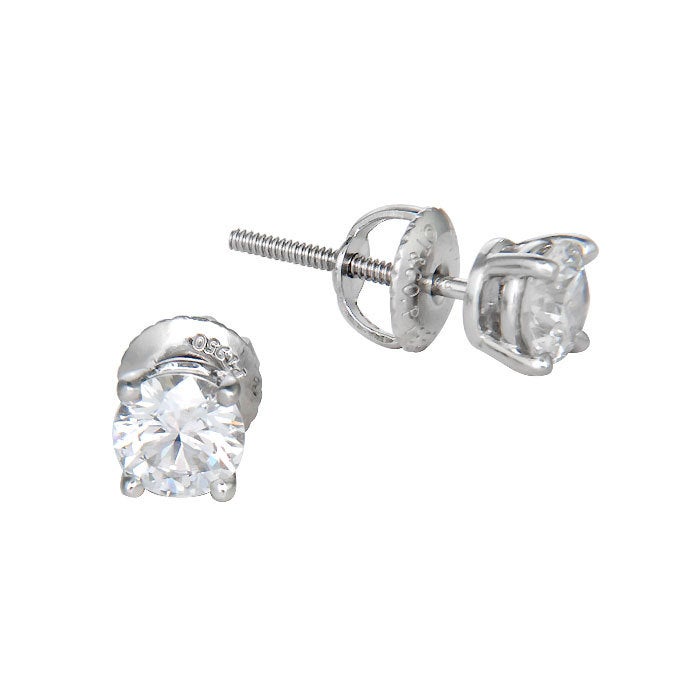 Tiffany & Company Diamond Stud Earrings, Platinum 4 prong Mountings with Screw Backs, set with .48 Carat each ear for a total of .96 Carat  Each Round Brilliant Cut Diamond is G in Color and VVS1 in Clarity. These earrings are New in the Tiffany