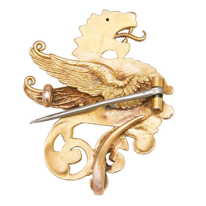 Very Detailed,Circa 1890 Griffin Brooch, 14K yellow Gold with a Diamond eye and a hook on the back for hanging a Locket or Pendant watch.
