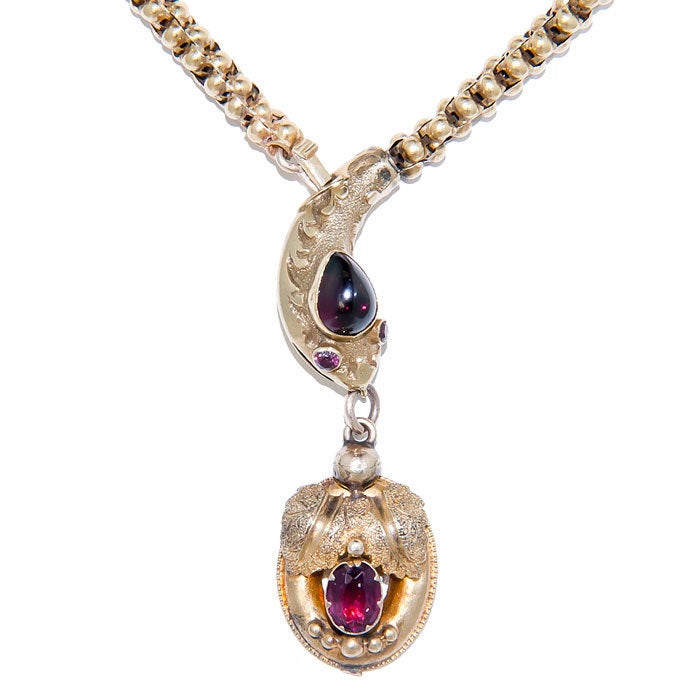 Circa: 1890 15K yellow Gold Snake Necklace, Very soft and Comfortable to wear, set with Garnets.