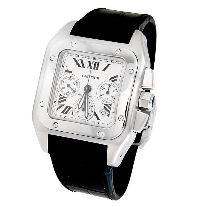 Stainless steel Cartier Santos 100 three-register chronograph wristwatch, automatic movement, calendar, silvered dial, sapphire crystal, leather strap with steel deployment buckle.