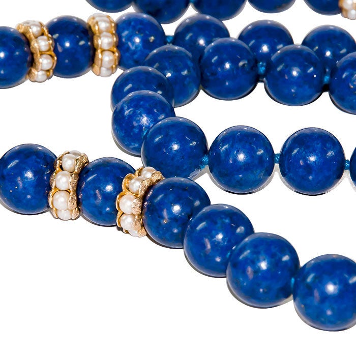 Very Impressive Strand of 14 M.M. Lapis Lazuli Beads with  sections of 14K Yellow gold and Pearls.