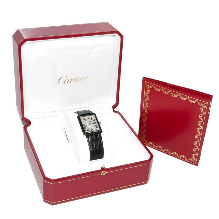 Cartier stainless steel Tank Solo wristwatch, quartz movement, stainless steel deployment buckle. Original Cartier Box.