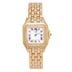 Retro Cartier Lady's Yellow Gold and Diamond Panther Wristwatch