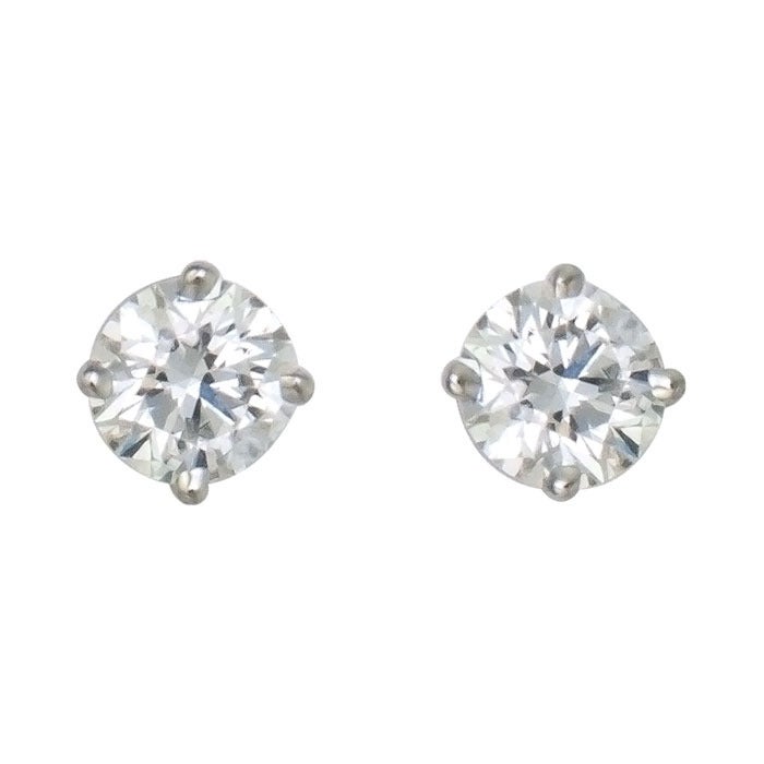 Tiffany & Company Diamond Stud Earrings, Platinum settings with Screw Backs, Diamonds total .44 Carat. G-H Color and Vs Clarity.