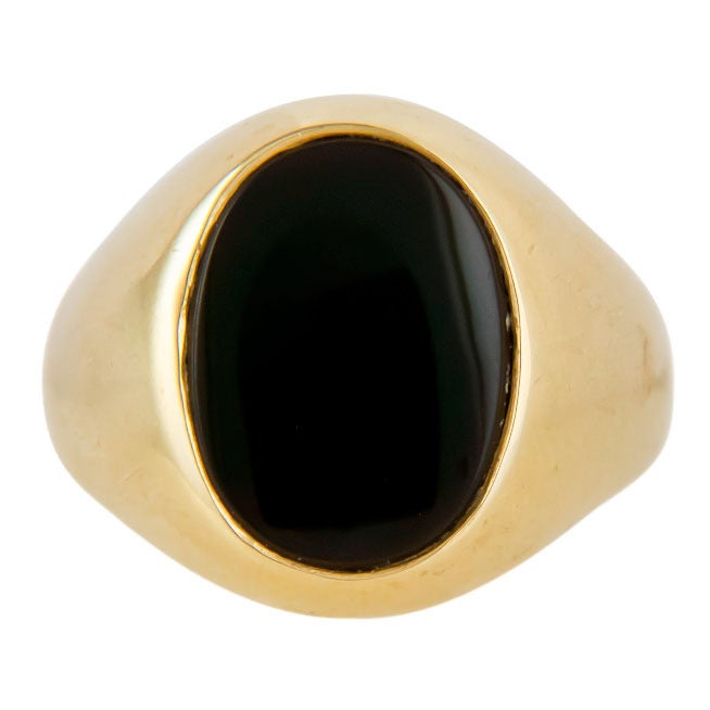 Classic Gentleman's Ring By Tiffany & Company, 18K yellow Gold and set with an onyx. Finger Size = 10.