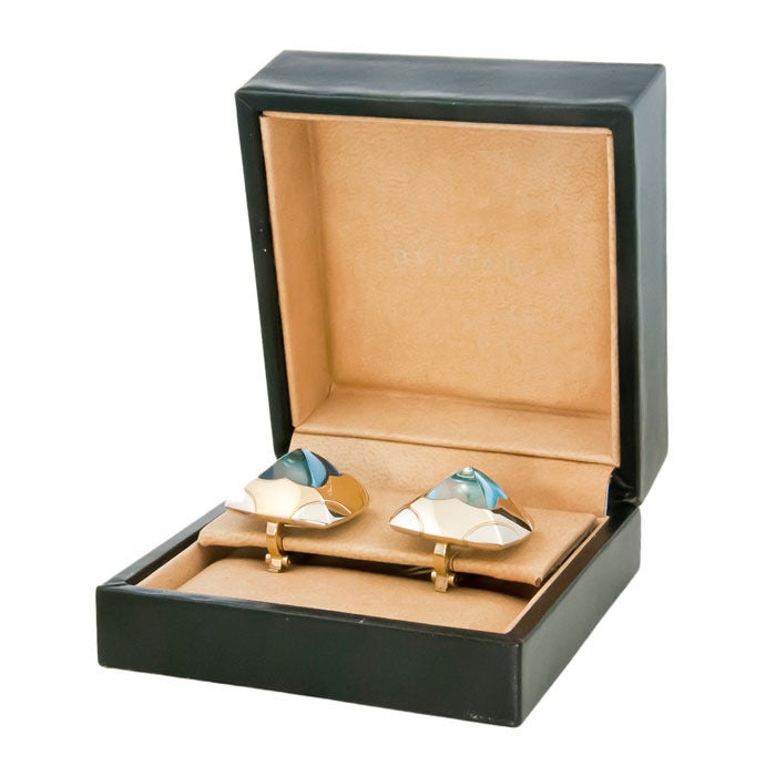18K Yellow and White Gold, Cabochon Aquamarine Ear Clips By Bulgari from the Pyramid Collection. Clip Backs, Post can be added if desired. Signed and Numbered and in The original box.