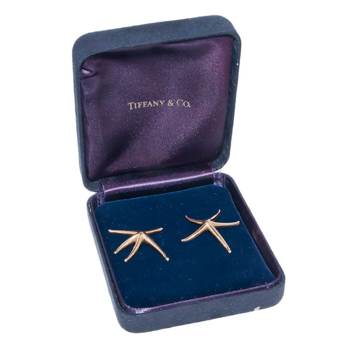 Circa: 1990 18K yellow Gold Star Fish Earrings By Elsa Peretti for Tiffany & Company. 1 1/2 Inch in Diameter