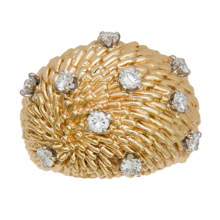 Circa: 1970s 18K Yellow Gold and Diamond Ring by Van Cleef and Arpels. Having a Textured Finish and set with 10 Round Brilliant Cut Diamonds totaling .40 Carats. Signed and numbered. Finger Size = 6
