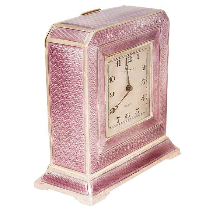 Sterling silver and light purple guilloche enamel eight-day desk clock, retailed by J. E. Caldwell. Lemania manual-wind movement. Silvered dial with black Arabic numerals, circa 1930s.