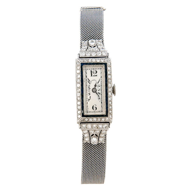 Patek Philippe Lady's Platinum, Diamond and Sapphire Wristwatch Retailed by Tiffany & Co. circa 1920s