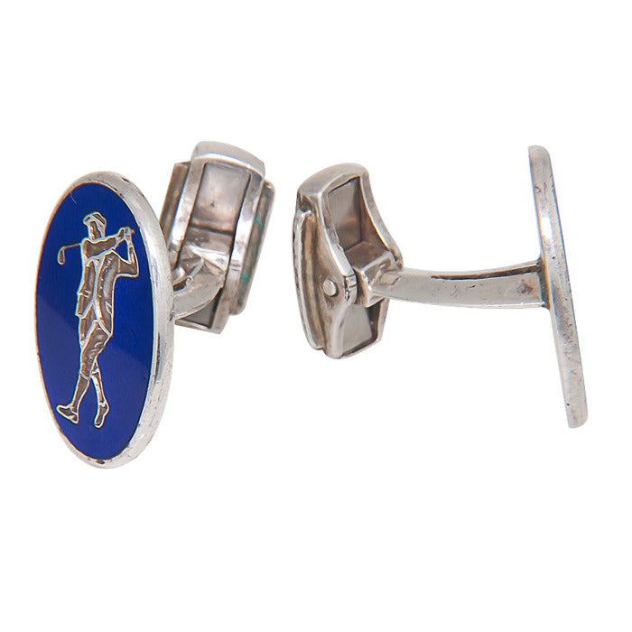 Circa: 1990 Sterling Silver and Blue Guilloche Enamel Golfer cufflinks. Moveable lever Backs.
