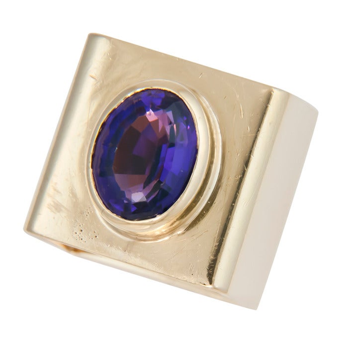 Circa: 1970s 18K Yellow Gold and Amethyst Ring by Dinh Van for Cartier. Cool 70s design.. Signed and Numbered, approximate finger size = 6 1/2