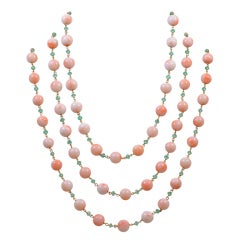 Long Strand of Angel Skin Coral and Emerald Beads