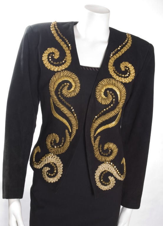Yves Saint Laurent Black Calf Leather Jacket.<br />
Amazing gold embroidery and beautiful buttons at the sleeves.<br />
Size 38 EU = 6/8 US<br />
Measurements:<br />
Length 20