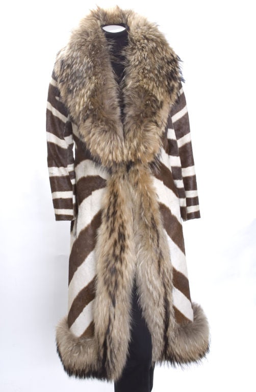 1960's Yves Saint Laurent Zebra and Fox Fur Coat.<br />
It was loved by the former owner and shows some signs of wear.<br />
<br />
Measurements:<br />
Length 46