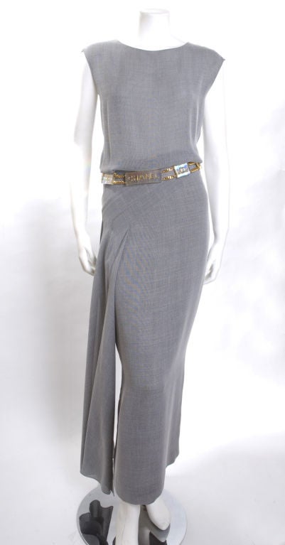 1998 Chanel Boutique Dress and Belt.<br />
Zipper in the back to waist line, the top closure 3 CC buttons.<br />
The belt is gilded metal and plexiglas.<br />
Skirt lining 100% silk<br />
Size 38 EU <br />
<br />
Measurement:<br />
Length 54