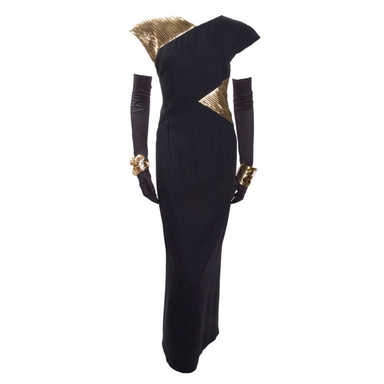 Valentino Boutique Gown black silk crepe with gold lame detail.<br />
<br />
Measurements:<br />
Length 57