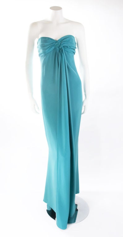 1987 Yves Saint Laurent Evening Gown.
It is in very good vintage condition.
Size 40 EU - 8 US

Measurements:
Length: back middle 51