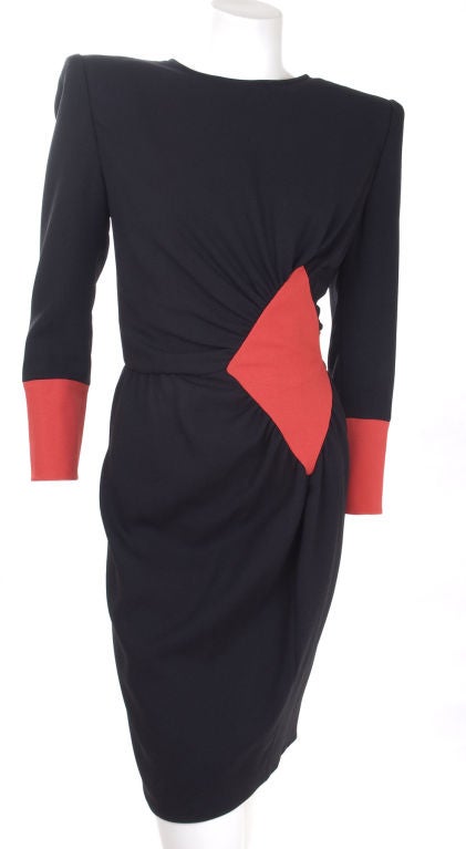 Very stylish vintage Valentino Night dress in black and red wool jersey.
Size US 8
Measurements:
Length 36 - bust 38 - waist 28 - hips 36 inches.

