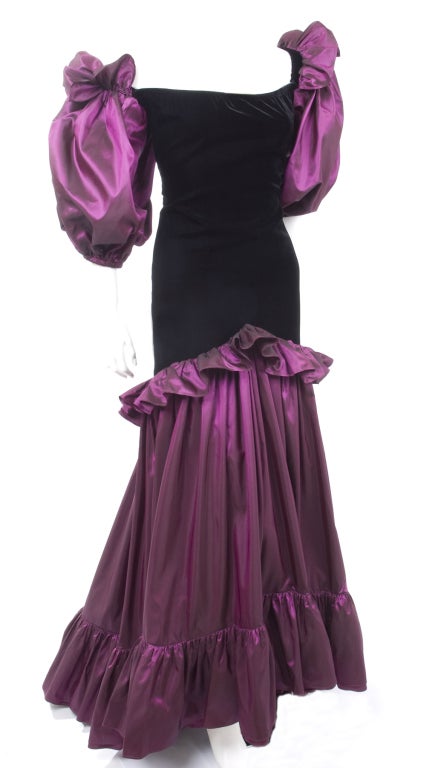 Vintage 80s Yves Saint Laurent Orchid Taffeta and Black Velvet Gown.
In excellent condition - no flaws to mention
Size 40 EU - about 8 US

Measurements:
Length front 54 - back 62 bust 38 - waist 33 - hips 40 inches

