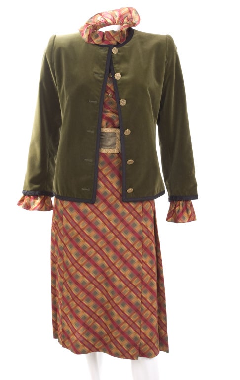 Vintage 1979 Yves Saint Laurent  silk blouse & skirt & belt ensemble with velvet jacket. Blouse with ruffles at neck and sleeves, it's a wrap skirt with two metal hooks closure. The belt is a soft suede leather with gilded buckle. Green