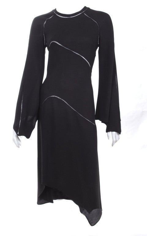 1971 Ossie Clark Black Dress with Hemstitch Seams.
Side and back zipper, unlined.
Excellent condition - no flaws to mention

Measurements:
Length: longest 55