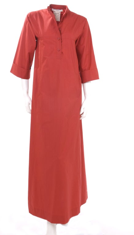 1971 Yves Saint Laurent Moroccan Inspired Cotton Maxi Dress.
The Dress is really a size 32 inches around the bust and falls loose around the hips.
Red cotton, Size 34 = 2/4 US
Excellent condition - never been worn and has no flaws to