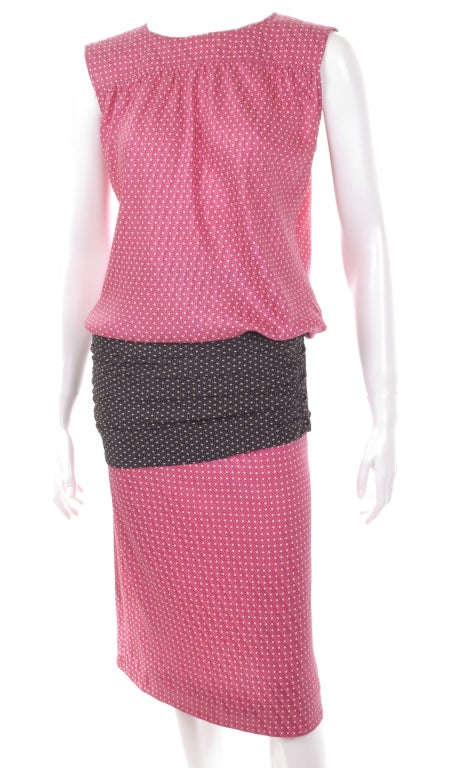 1980 Ungaro  silk dress in hot pink and black belt with white dots.
Inside the dress is a hidden waistband for perfect fit, please see picture.
The dress is in excellent condition but missing the Ungaro label.
I think this piece is fabulous even