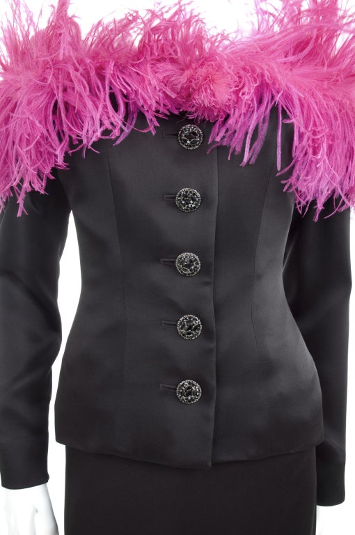 black dress with pink feathers