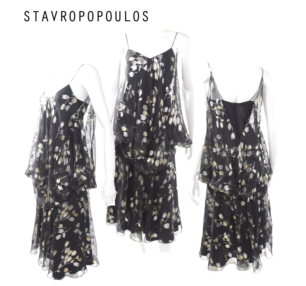 Stravropoulos Silk Chiffon Cocktail Dress.
Gold and silver metallic leafs on silk chiffon and black silk satin slip.
Size 6
Excellent condition - no flaws to mention.

Measurements:
Length 47