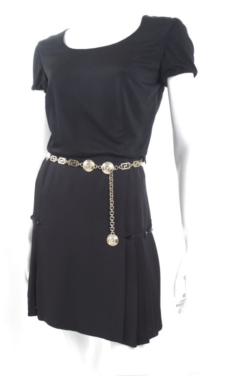 Gianni Versace Wrap Skirt, Top and Belt
Size 40 EU - 6 US

Measurements:
Top length 16