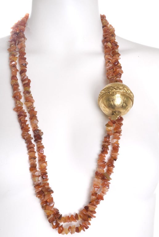 Yves Saint Laurent Necklace.
The gemstone strand measured 31.5 inches
and the circumference of the ball is 5.5 inches.
Excellent condition

Length 31.5

