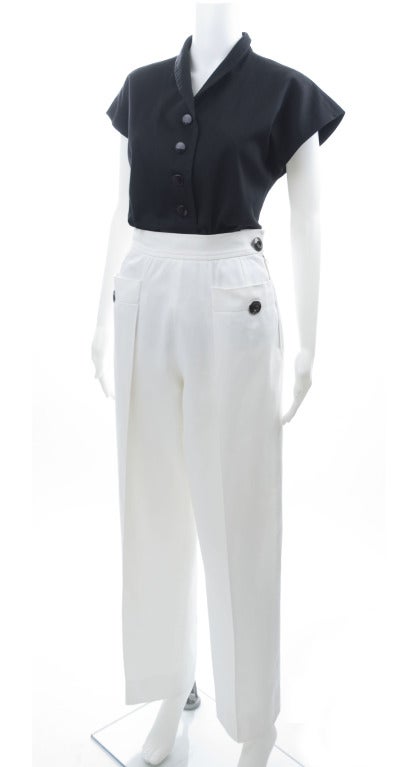 80's Yves Saint Laurent Black Blouse White Pants.
Wide leg pants.
Size 40  EU - US 6
Measuremets:
Blouse length 25