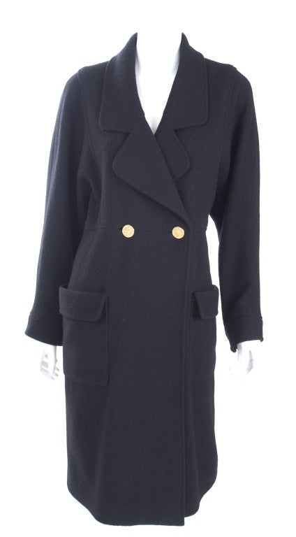 Chanel Boutique Black Coat With Gold Buttons
Black wool.
Size label missing - about  8 US

Measurements:
Length 41.5