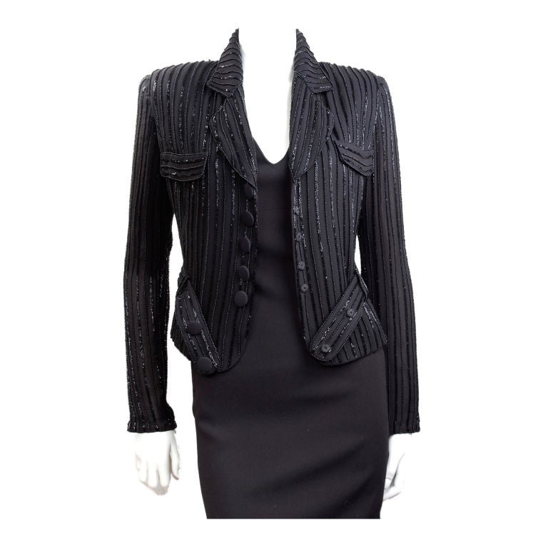 90's Giorgio Armani Luxurious Beaded Black Jacket.
Size 6 US
Excellent condition.
Measurements:
Length 19.5 - Bust 36 - Waist 30 - Shoulder 16 - Sleeves 24.5 inches.

