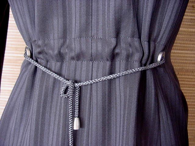 Guaranteed authentic STATE OF CLAUDE MONTANA divine Collectors suit.
One button double breast skirt suit in a fabulous slate grey on grey stripe.  
All the silver buttons have STATE OF CLAUDE MONTANA EMBOSSED. 
Two slanted pockets with the