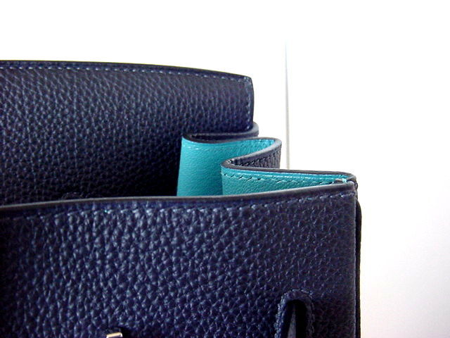 This unique rich, deep blue is gorgeous.  <br />
The sparkling turquoise interior colour combination makes this SO exotic.<br />
Special ordered one of a kind bag in togo leather.  Also available in Fjord leather!<br />
Togo leather is textured