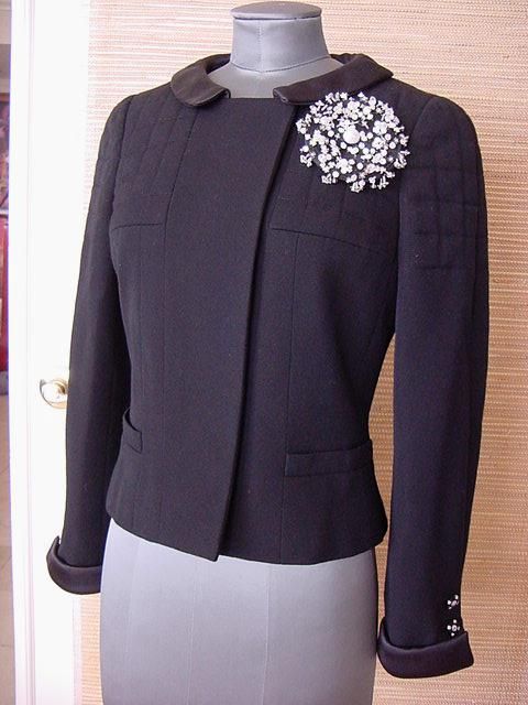 **Buyer MUST contact me prior to purchase for shipping and payment requirement details.
mad4couture@gmail.com**
Guaranteed authentic CHANEL 06A stunning jet black jacket with the most EXQUISITE pin.
This short, beautifully shaped jacket is