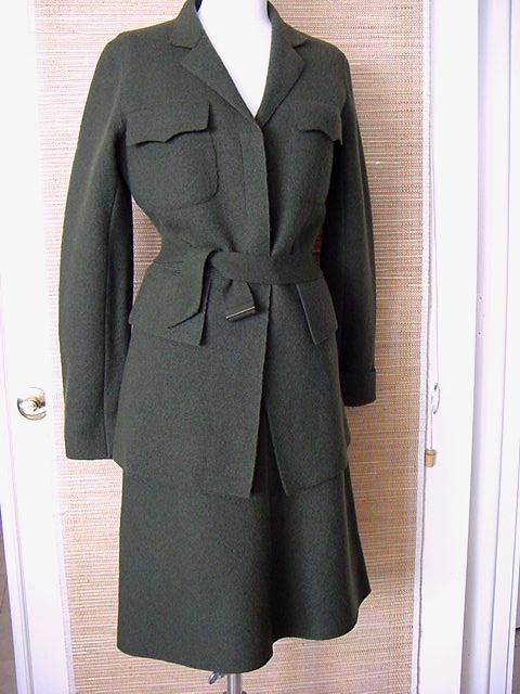 The Wool is a rich, deep moss green.<br />
The fabric texture is very unique - almost like a veldt.<br />
This ALAIA suit is chic and utterly wearable. <br />
The 3 button single breast jacket has gorgeous shaping and stitch detail.<br />
The