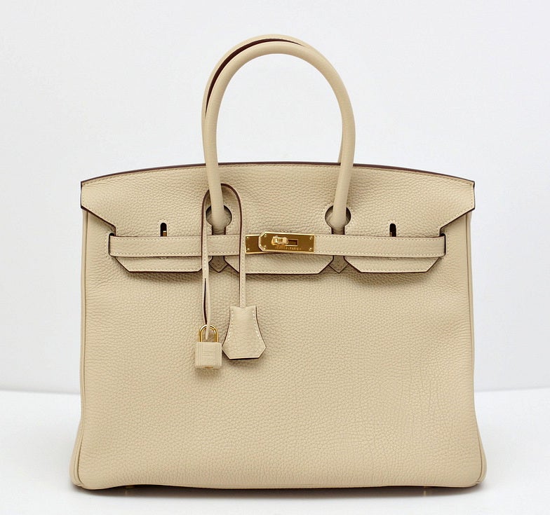 Sophisticated PARCHEMIN is a beautiful colour like french vanilla ice cream.
Pure luxury with the glow of the gold hardware!
Togo leather is textured to be scratch resistant and is butter soft to the touch.
Very rare bag in this creamy neutral