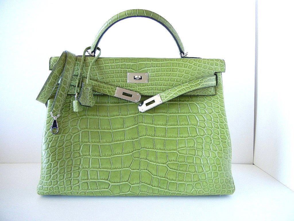 A TO DIE FOR beauty that is SO exquisite, rare, and utterly breathtaking! 
This Matte Alligator supple Kelly is the most gorgeous, neutral green.  
This beauty is accentuated with the the fresh Palldium hardware.   
BRAND NEW.  NEVER