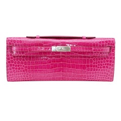 HERMES Clutch KELLY CUT convoité Fuschia Pink Porosus Crocodile