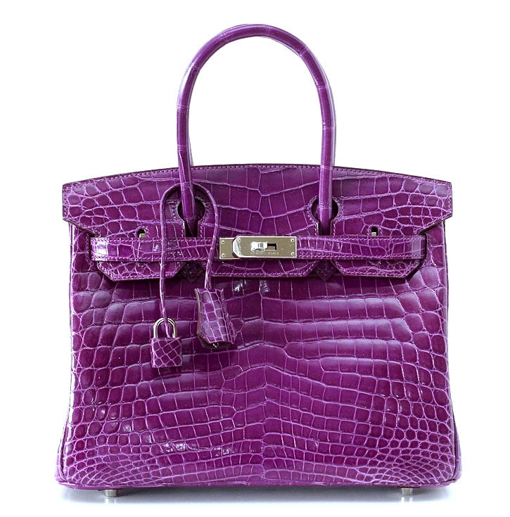 Exquisite jewel toned VIOLET crocodile. 
This beauty is accentuated with the PALLADIUM hardware. 
Perfect day to dinner size!  
BRAND NEW, NEVER WORN  
Comes with the lock and keys in the clochette, original  orange box, sleeper and ribbon. 