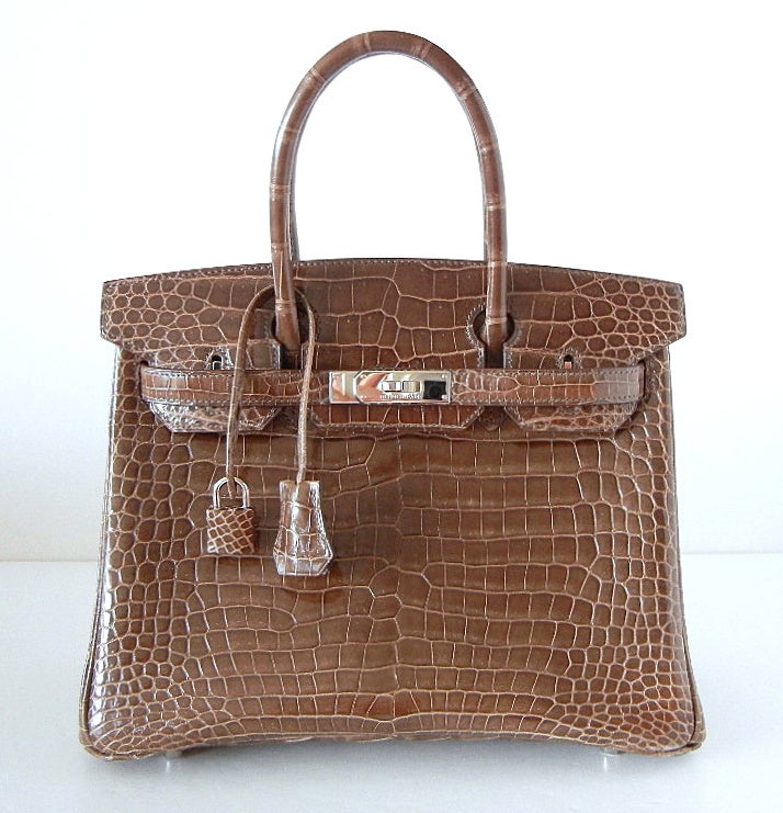 Utterly exquisite ELEPHANT GRAY Porosus Crocodile HERMES Birkin. 
Unique colour is sophisticated and perfectly neutral.  
This beauty is accentuated with the palladium hardware. 
Perfect day to dinner size!  
Pre Own.  Absolutely clean interior