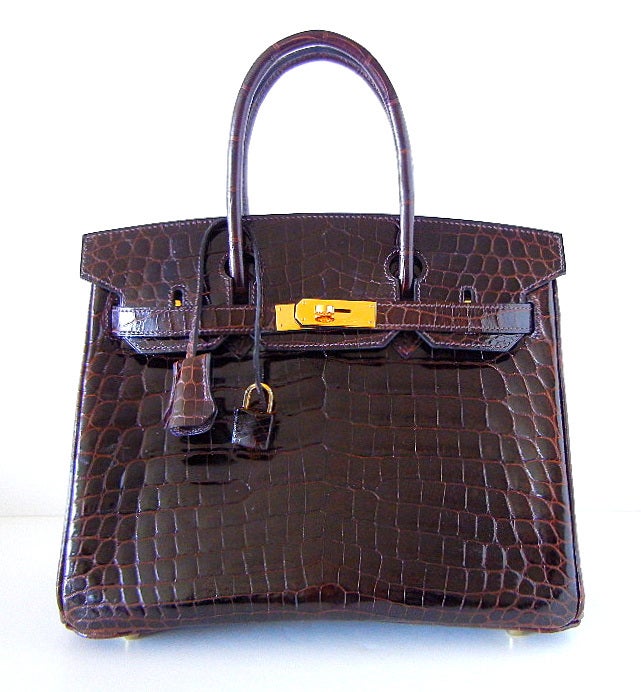 **Buyer MUST contact me prior to purchase for shipping and payment requirement details.  No exceptions.
whatsapp 305.588.5788 USA country code 1
mad4couture@gmail.com**
Chic COCOAN Crocodile HERMES Birkin. 
This beauty is accentuated with the