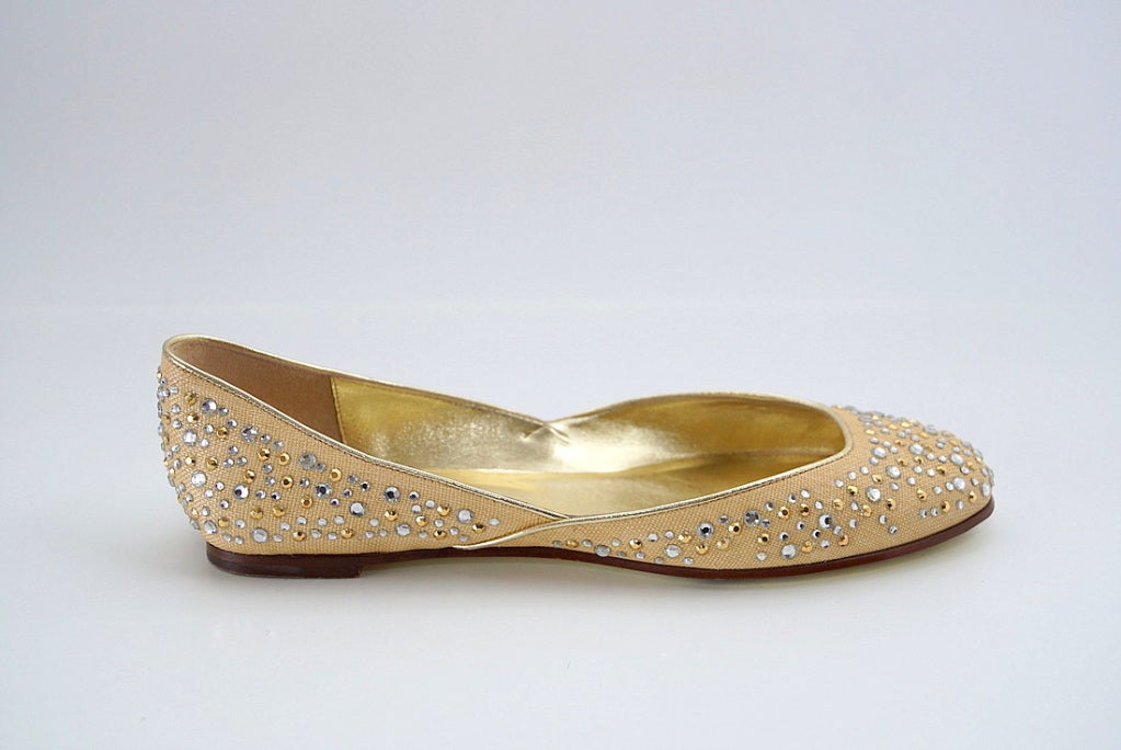 **Buyer MUST contact me prior to purchase for shipping and payment requirement details.
mad4couture@gmail.com**
Ballet flat in soft golden yellow textured textile covered in diamantes and gold faceted studs.
Cut in on the sides makes this ballet