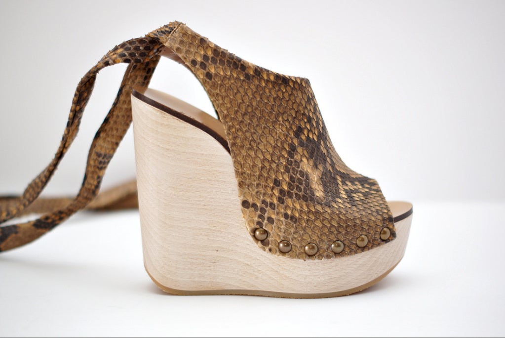 snakeskin wedge booties